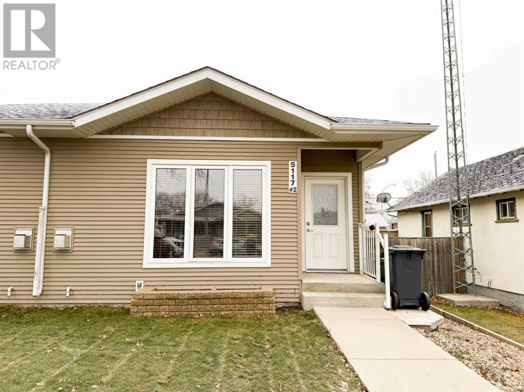 <h3>$289,000</h3><p>#2, 5117 54 Avenue, Ponoka, Alberta</p>